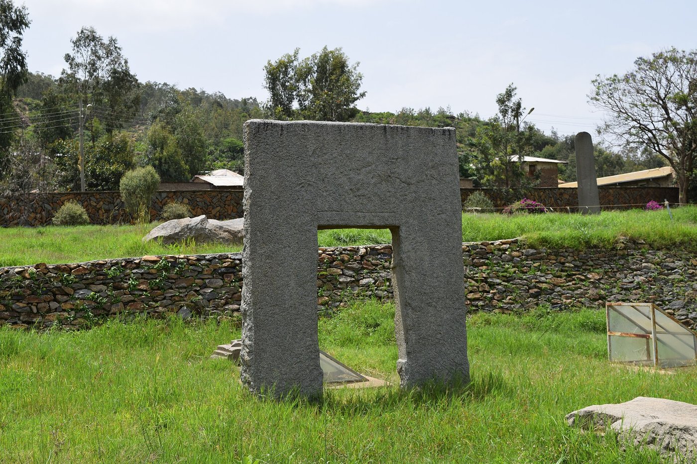 The broken sections of the Great Stele of Aksum lying on the ground