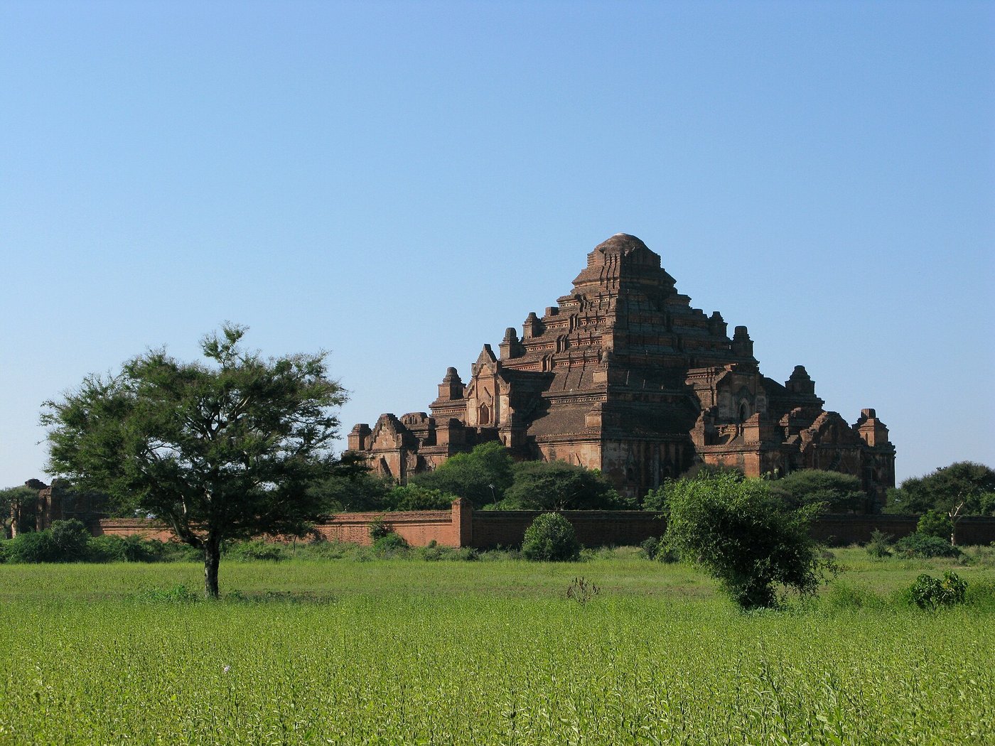 The Dhammayangyi Temple, an enormous pyramidal brick temple with steep terraced sides dominating the surrounding plain