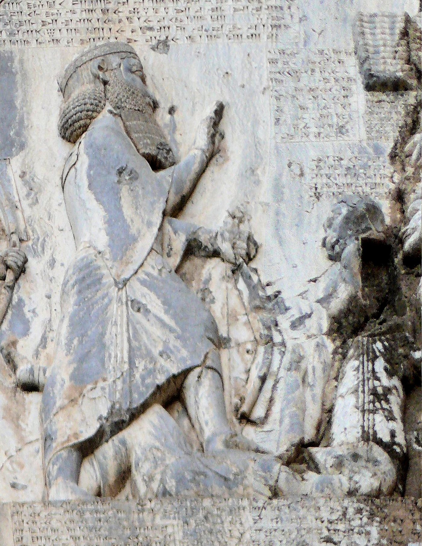 Detail of the Behistun relief showing King Darius standing with his foot on the chest of the fallen figure of Gaumata