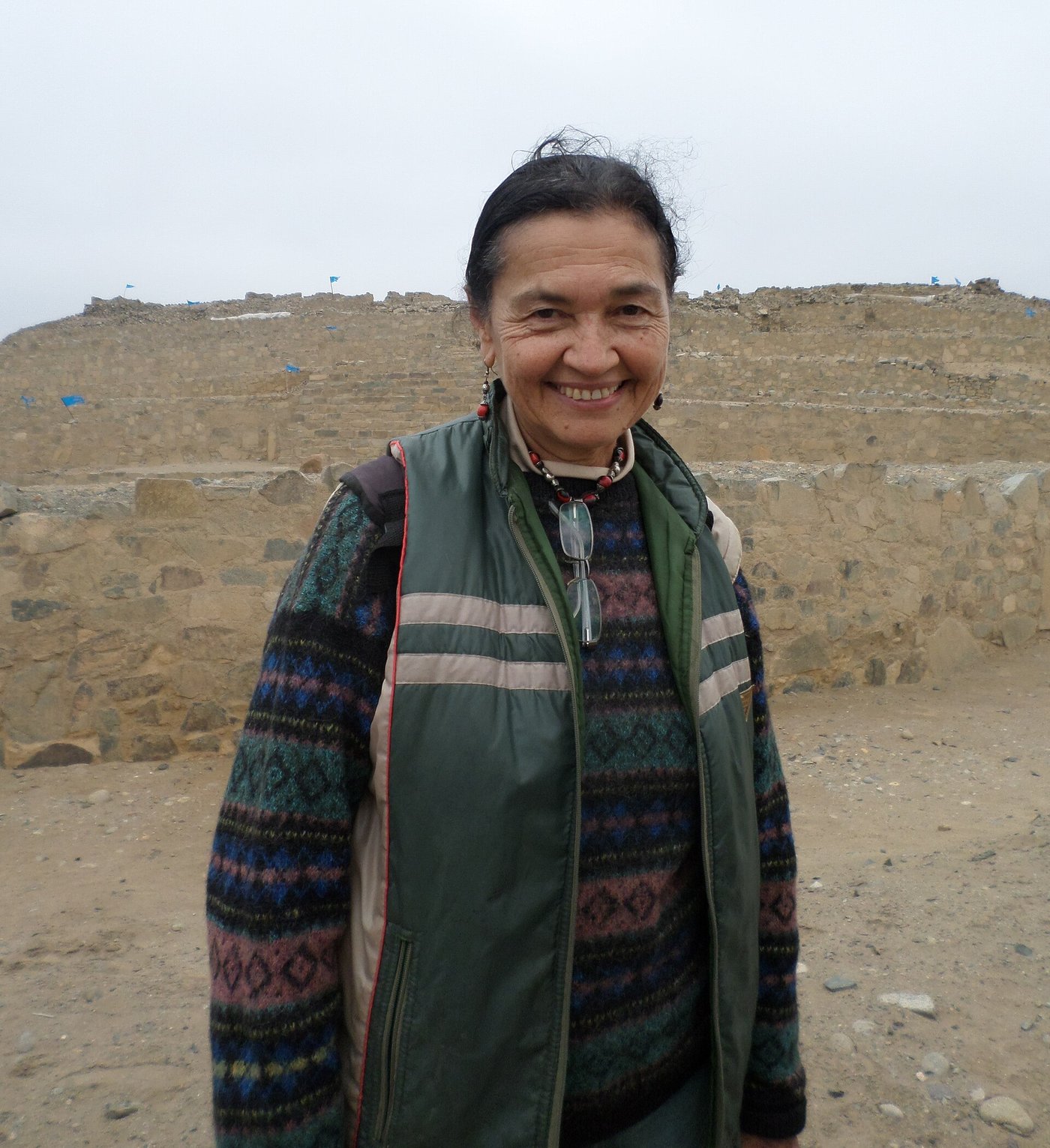 Archaeologist Ruth Shady standing at the archaeological site of Caral in 2014
