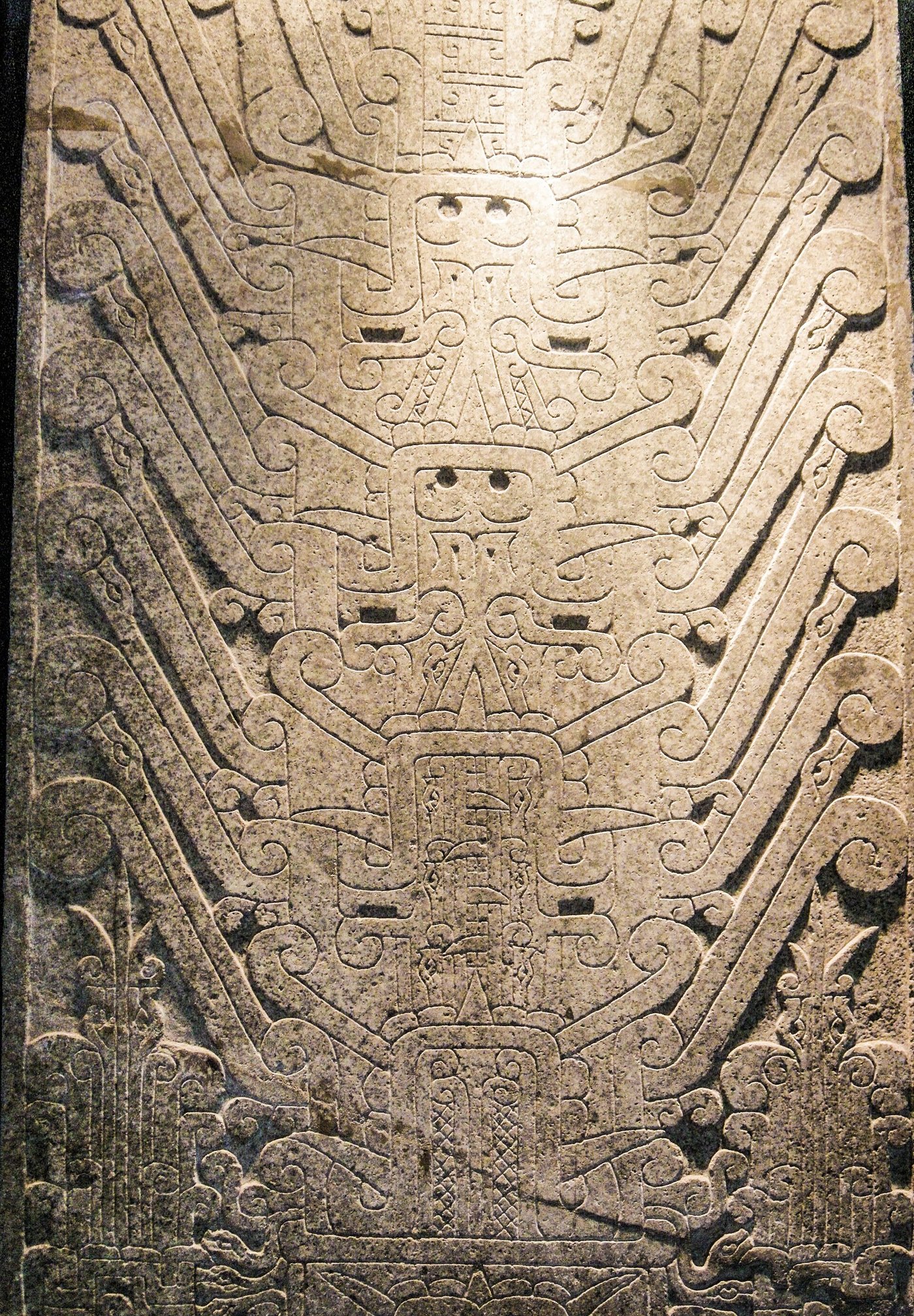 The Raimondi Stela, a tall engraved granite slab showing the Staff God, a standing deity holding a staff in each hand