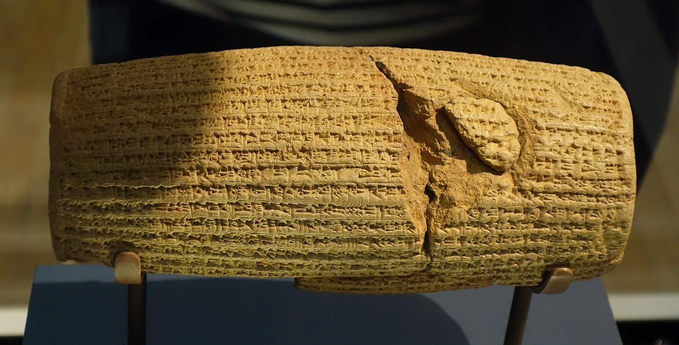 Close-up of the wedge-shaped cuneiform script covering the surface of the Cyrus Cylinder