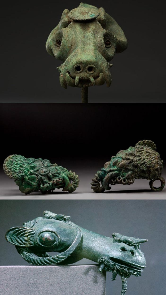 Bronze pendants in the form of a leopard's head and rams' heads from Igbo-Ukwu
