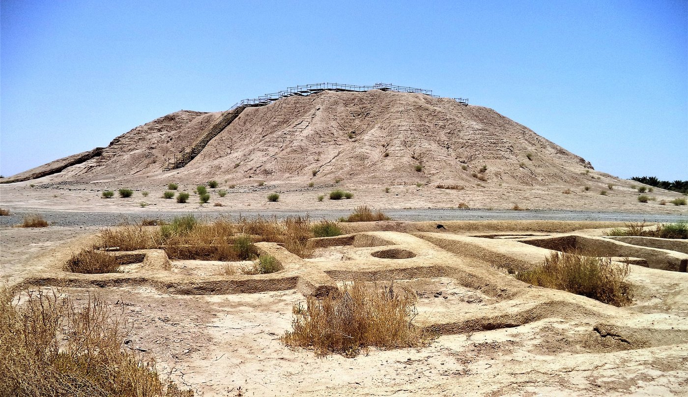 The eroded mud-brick mound of Konar Sandal south of Jiroft under a clear sky