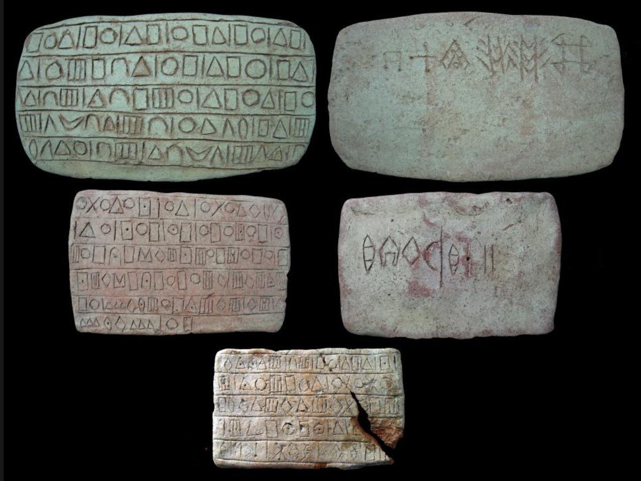 A Jiroft clay object bearing rows of incised geometric signs