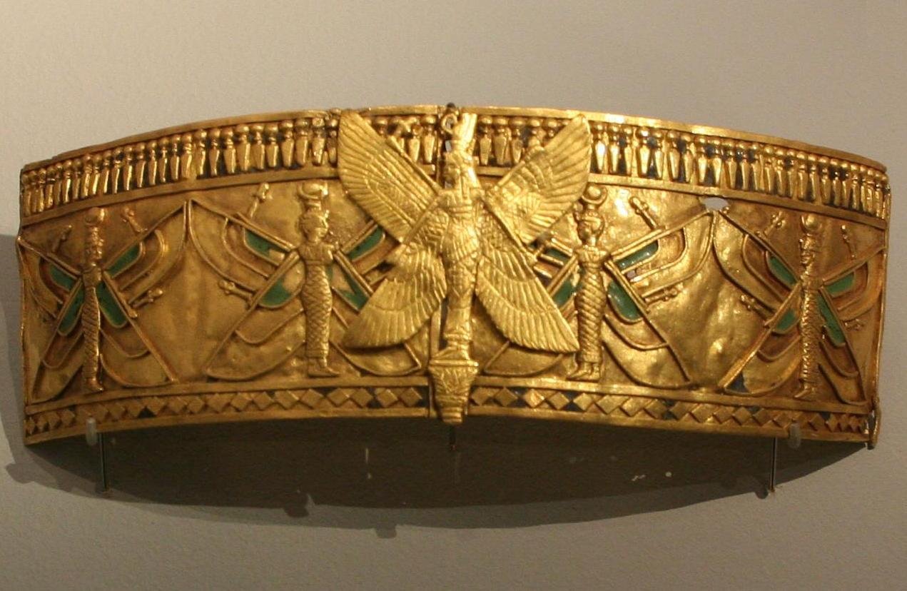 A gold Kushite armlet from Amanishakheto's treasure, decorated with a winged goddess, displayed in Munich