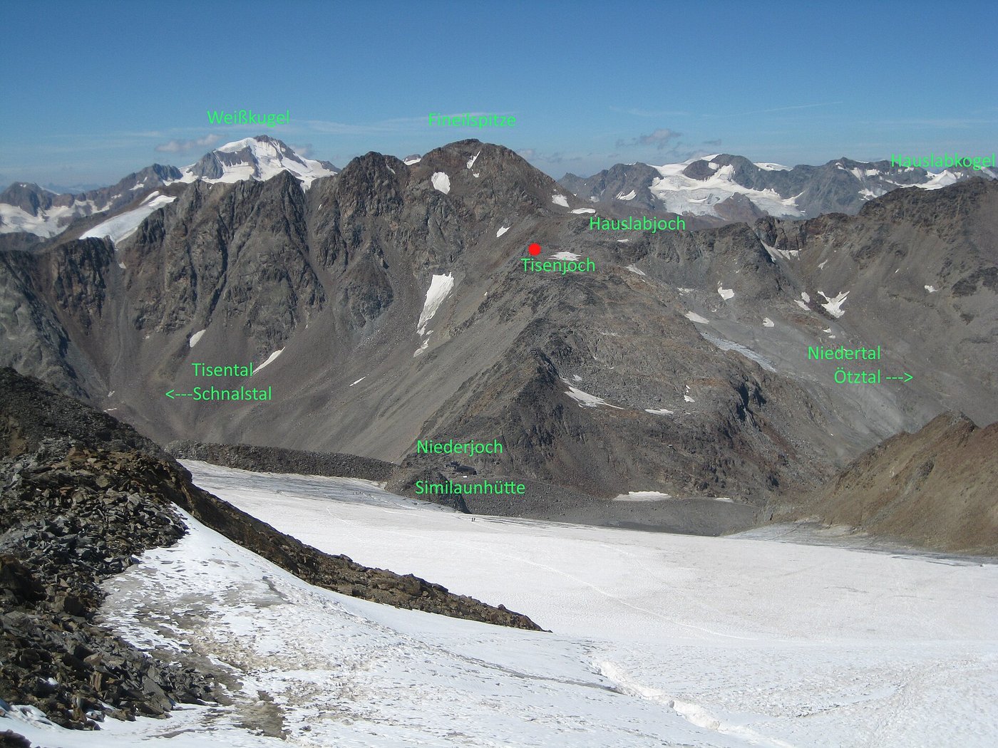 The rocky saddle at the Tisenjoch in the Ötztal Alps where the Iceman was found, marked by a stone cairn