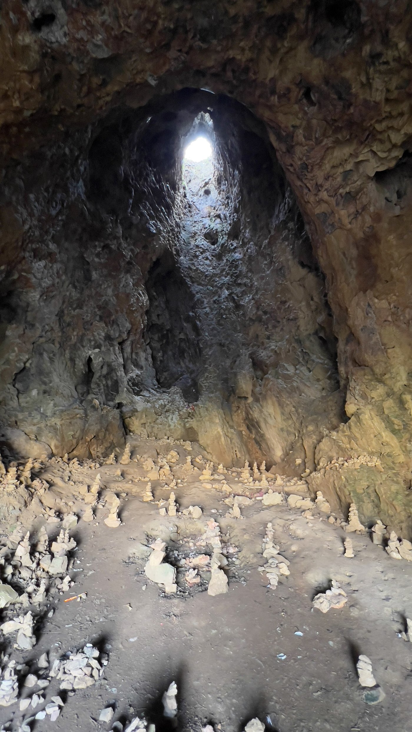 A limestone cave with a natural opening in its roof at Site 1 of the Plain of Jars