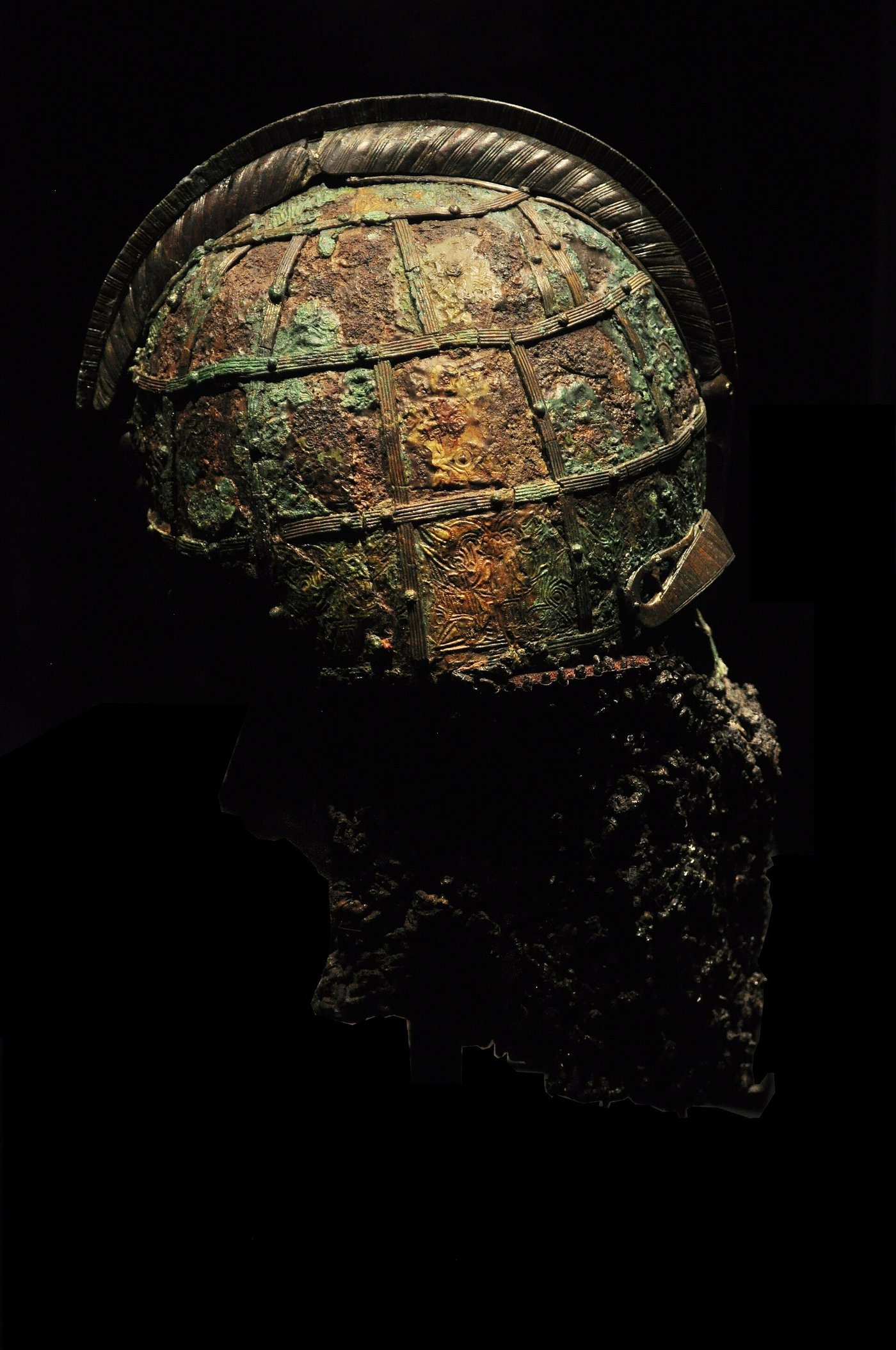 An ornate 7th-century Vendel-era helmet from a boat grave at Valsgarde, Sweden, with a decorated crest and iron panels