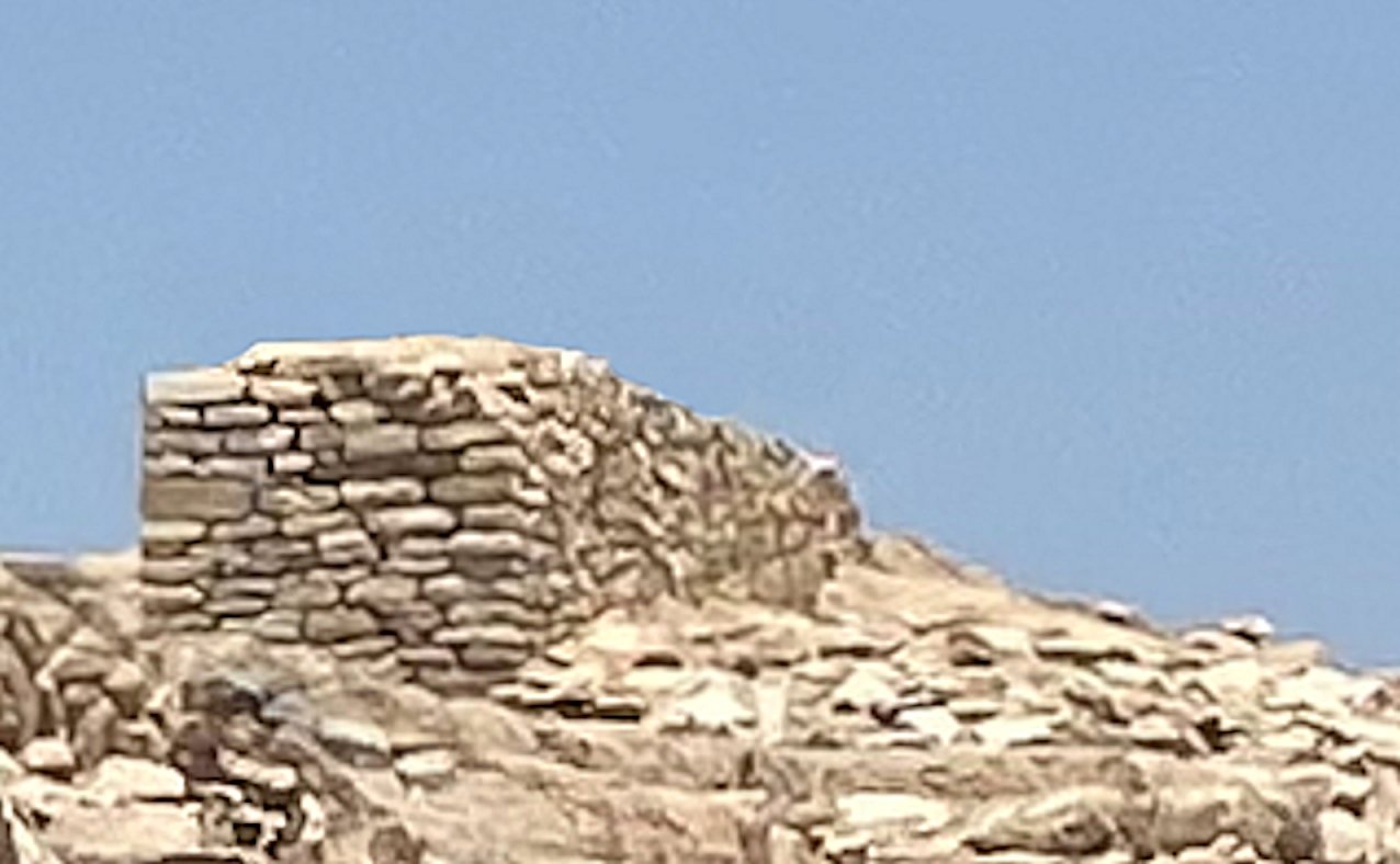 Massive dry-stone wall of the Shimao archaeological site in Shaanxi, China, built from stacked flat stones