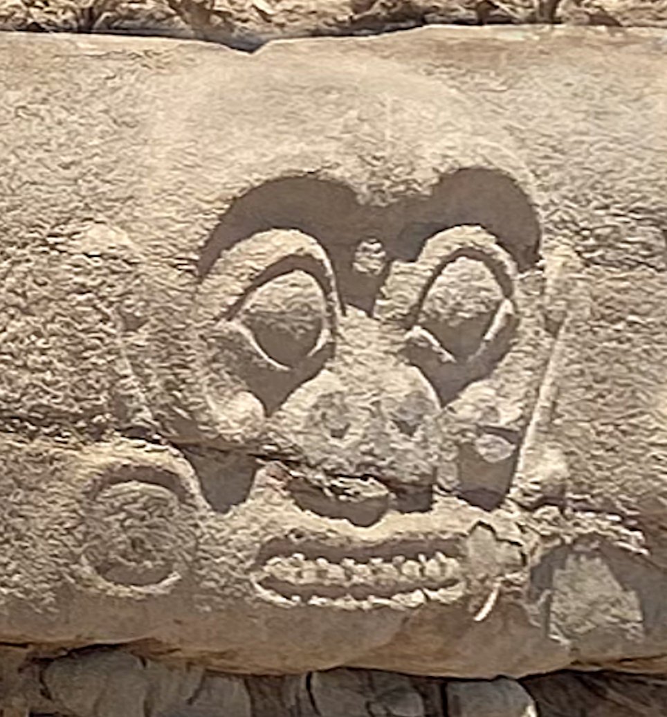 Carved animal face relief on a stone block from the Shimao Neolithic site