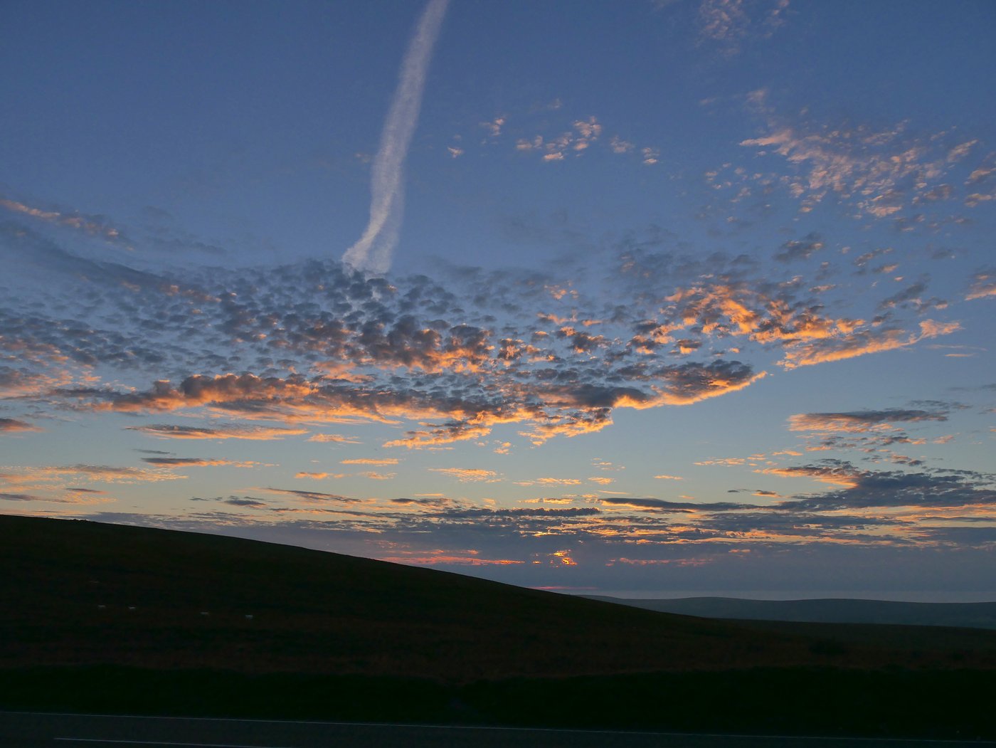 A wide view of the Preseli Hills in Pembrokeshire, west Wales, showing rocky tors on a low windswept ridge