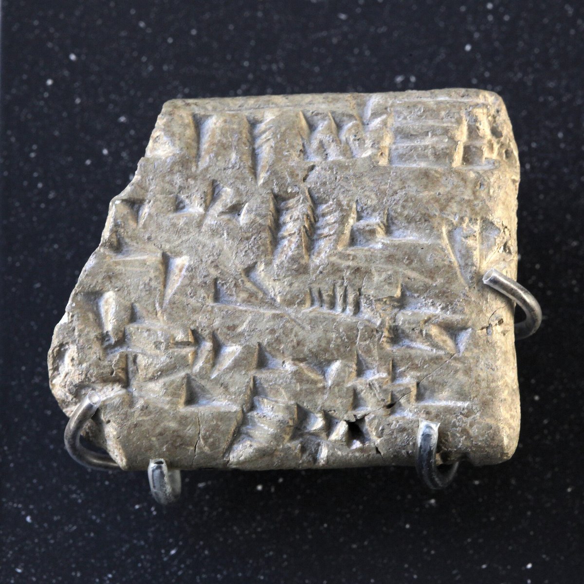 A Late Bronze Age clay tablet covered in cuneiform writing