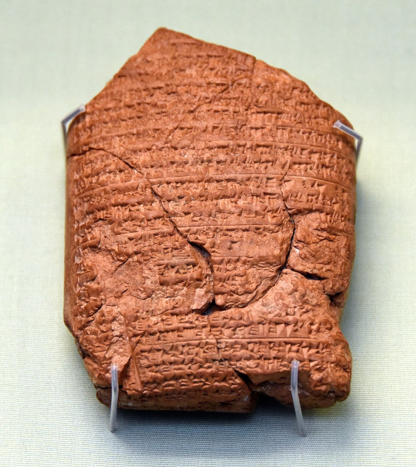 A small rectangular clay tablet covered in dense cuneiform writing, from Babylon, recording Nebuchadnezzar's capture of Jerusalem