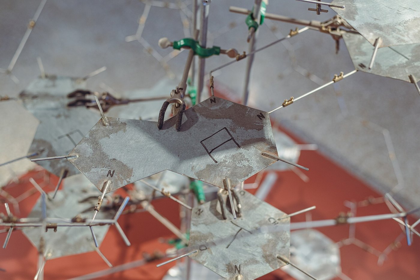 A replica DNA double helix model illustrating the genetic sequencing behind the discovery