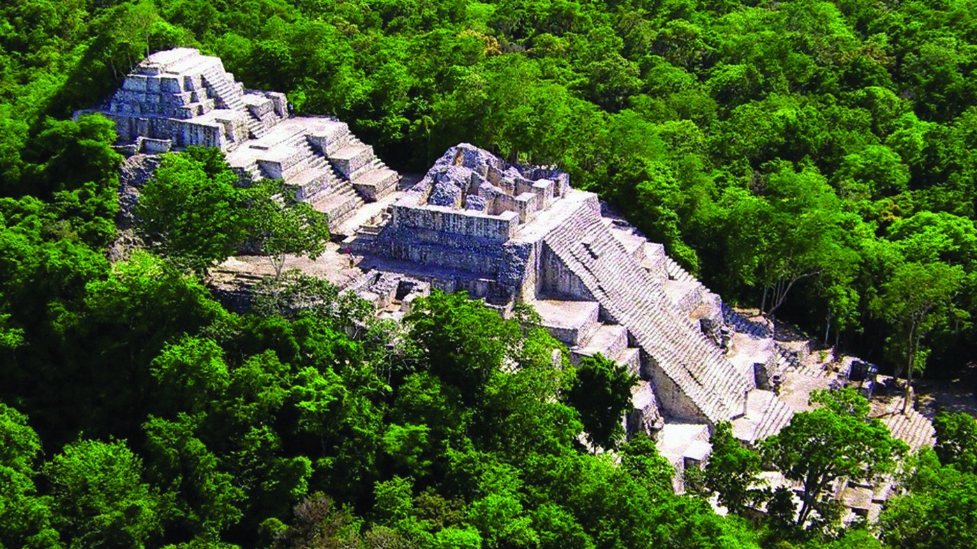 The great pyramid Structure II rising above the jungle canopy at Calakmul
