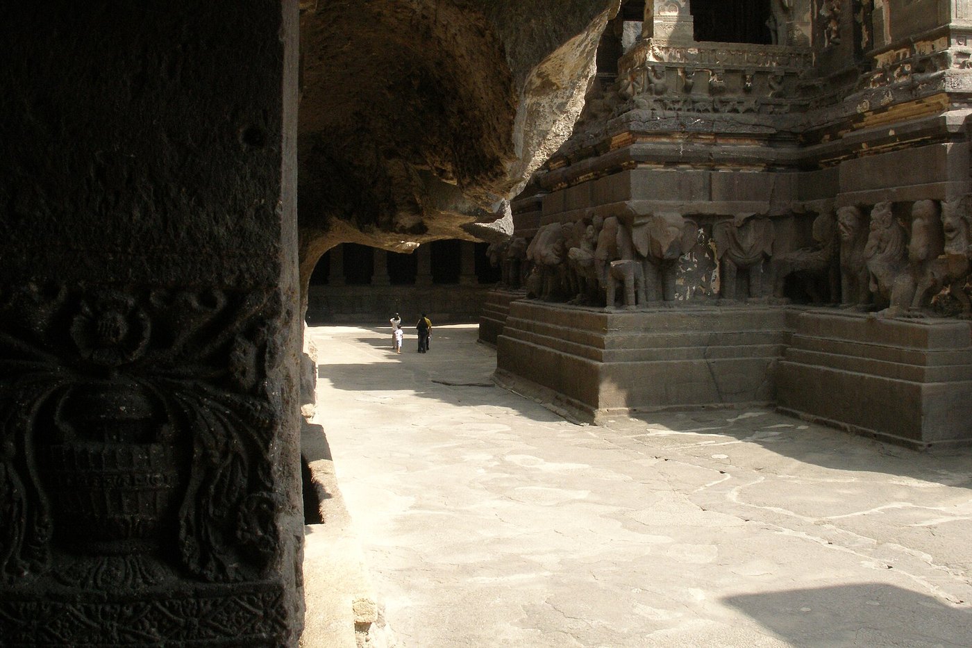 Aerial view of the Kailasa Temple at Ellora showing the tower and courtyard cut down into the surrounding rock cliff