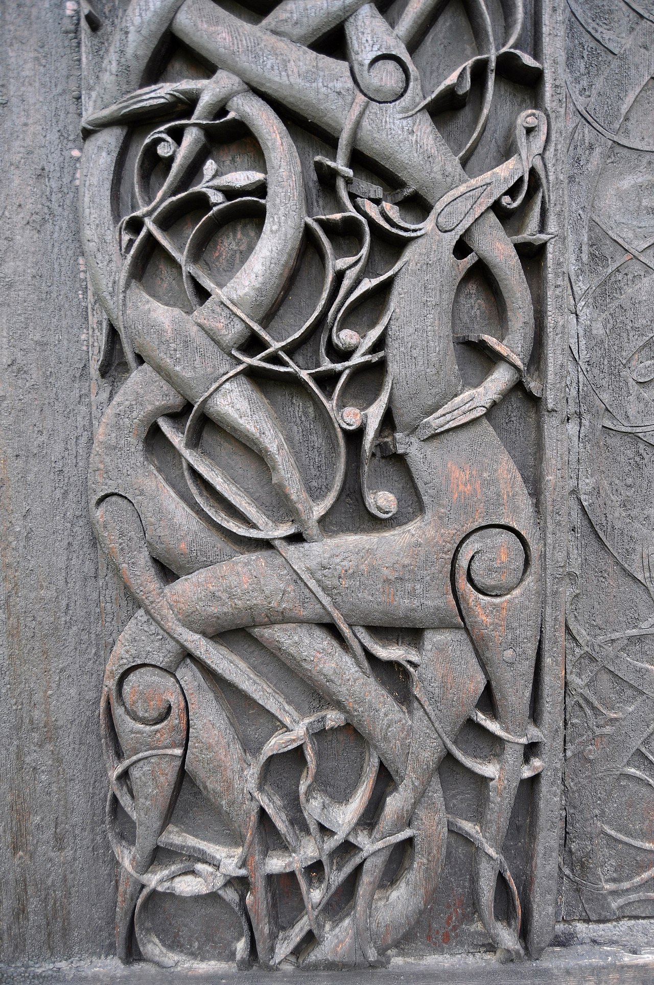 A medieval Norse wood carving evoking Ragnarök and the doom of the gods