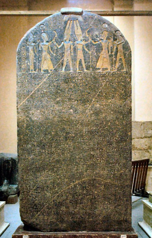 The Merneptah Stele, a tall inscribed black granite slab, in the Egyptian Museum in Cairo
