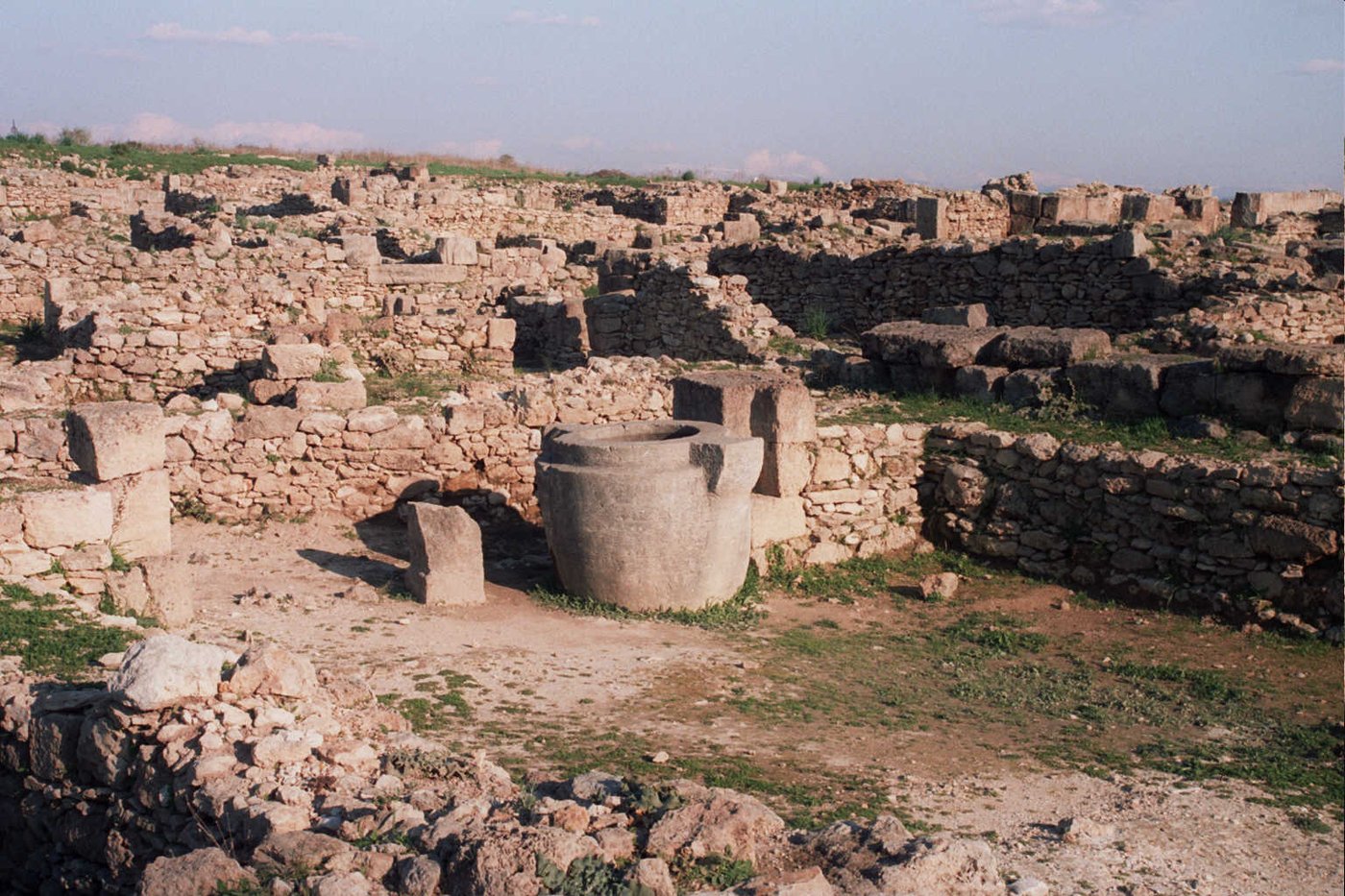 The excavated stone ruins of the ancient city of Ugarit at Ras Shamra in Syria