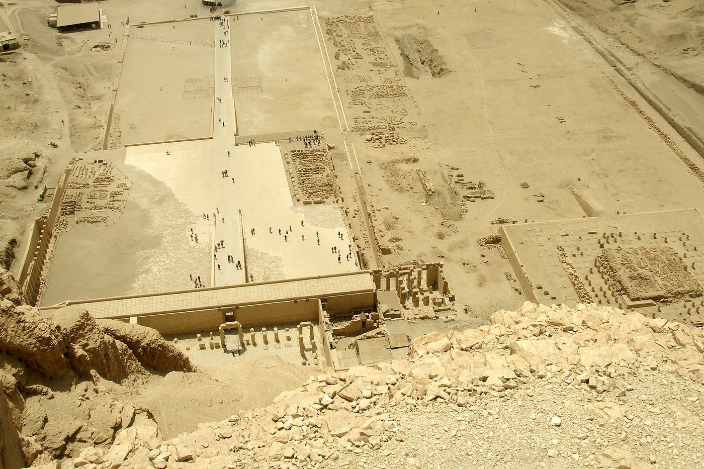 Aerial view of the mortuary temple of Hatshepsut at Deir el-Bahari, its terraces set against tall desert cliffs