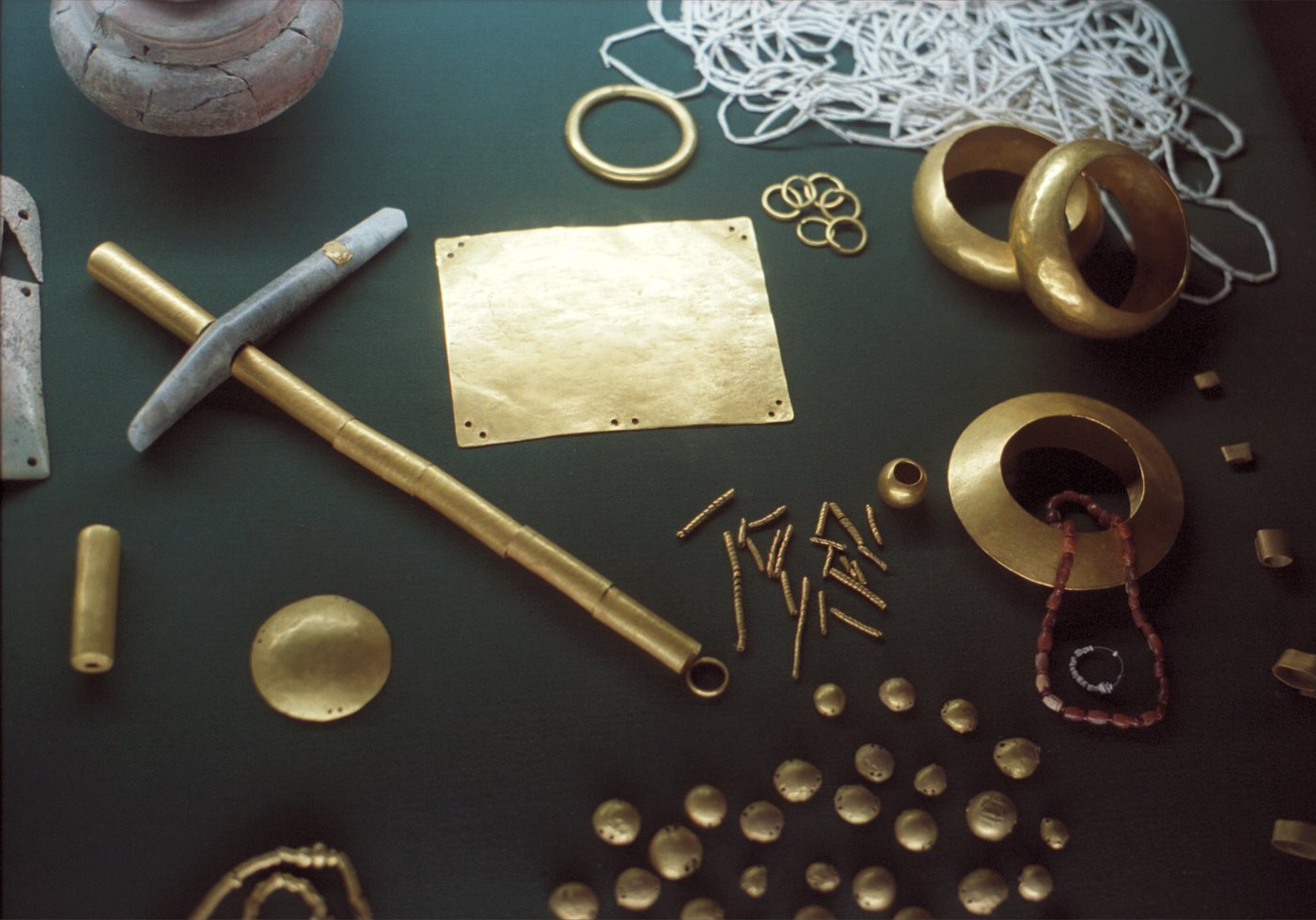 A display case of small gold ornaments, rings, beads and plates from the Varna necropolis