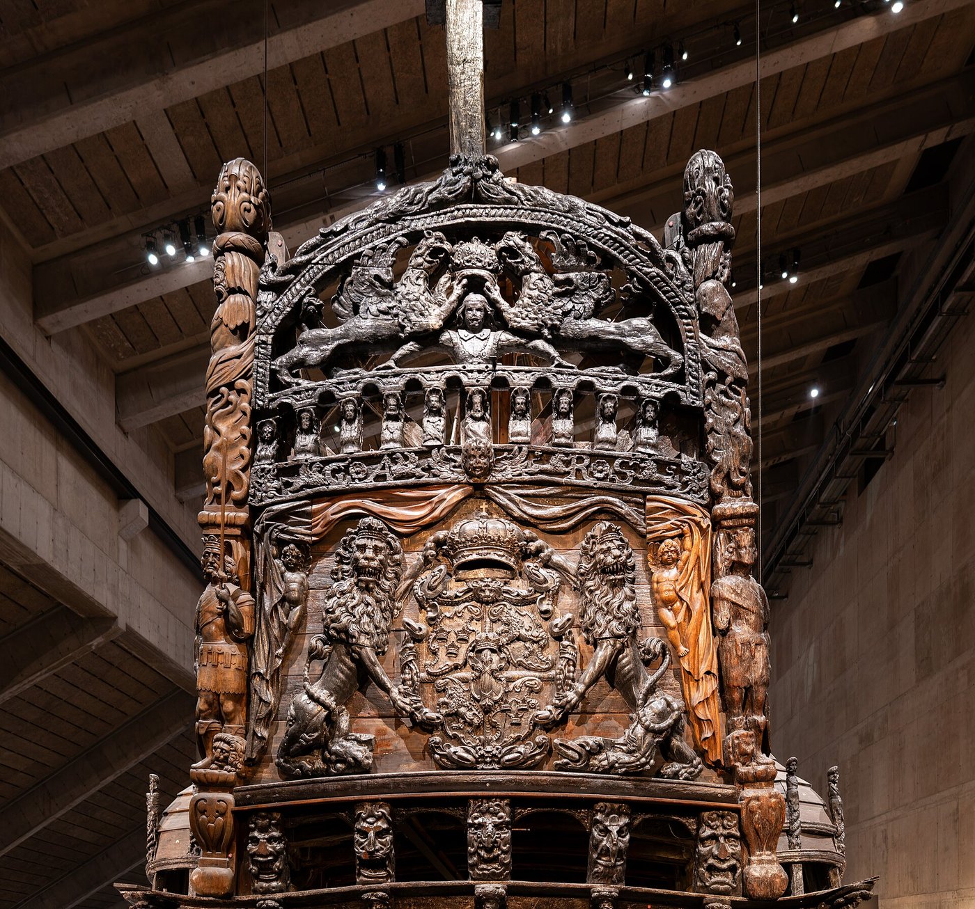 The tall carved and gilded stern of the Vasa, crowded with hundreds of sculpted figures