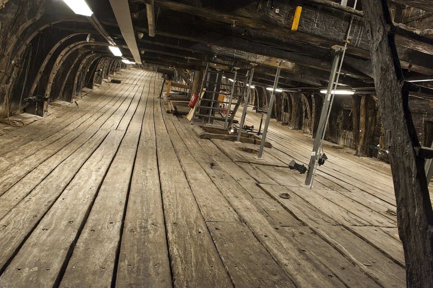 The Vasa’s lower gun deck, a long dark timber gallery lined with square gun ports
