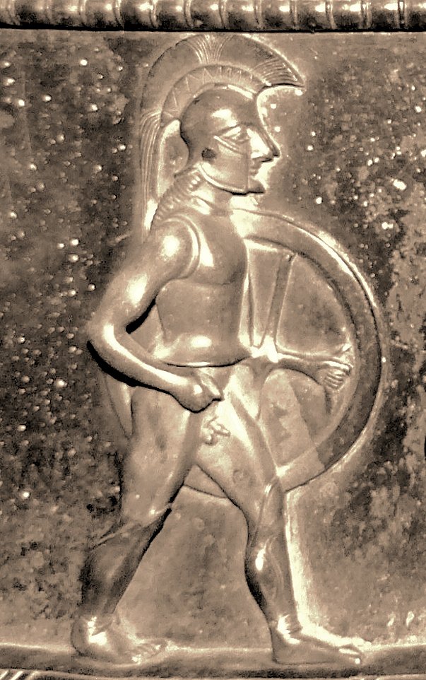 Detail of the frieze on the neck of the Vix krater showing a helmeted Greek hoplite on foot beside a four-horse chariot