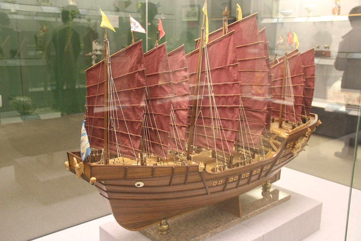 A large scale model of one of Zheng He's nine-masted treasure ships, shown with red sails