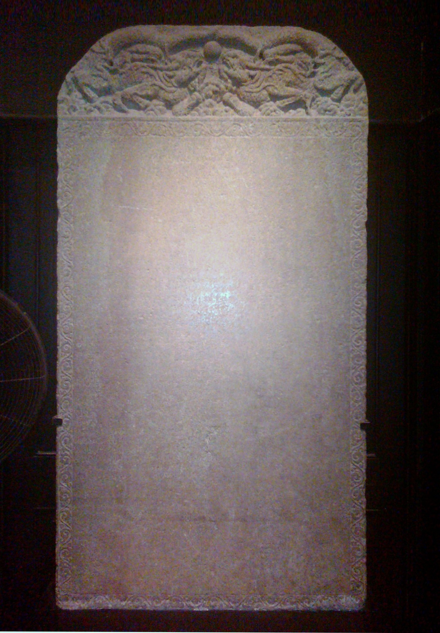 The Galle Trilingual Inscription, a weathered stone stele carved with text in Chinese, Tamil and Persian